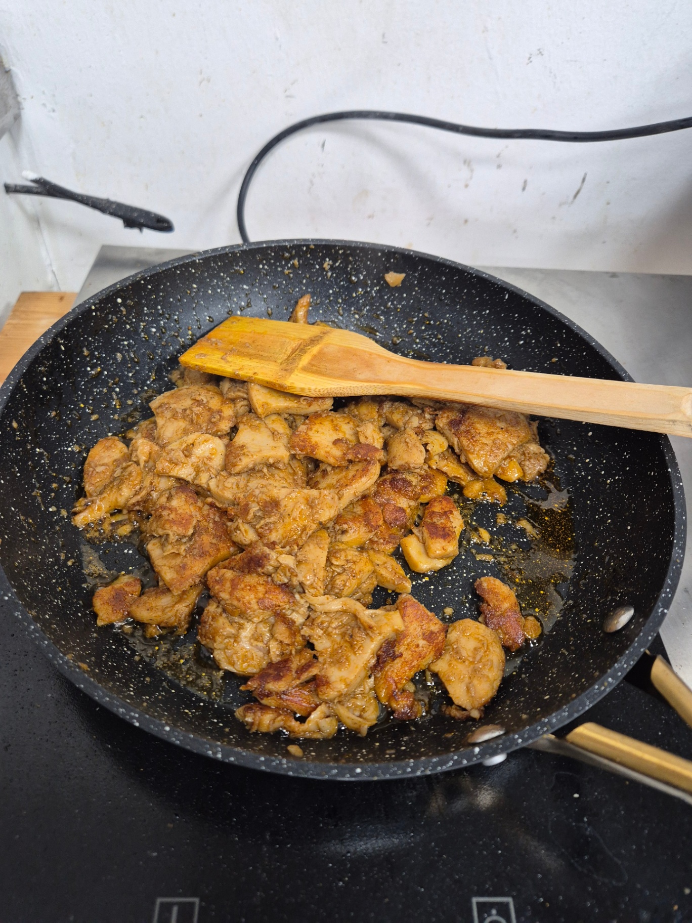 Sautéed seasoned Provero chunks in pan