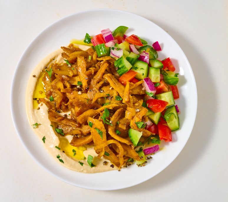 Provero protein cuts on hummus with olive oil and paprika