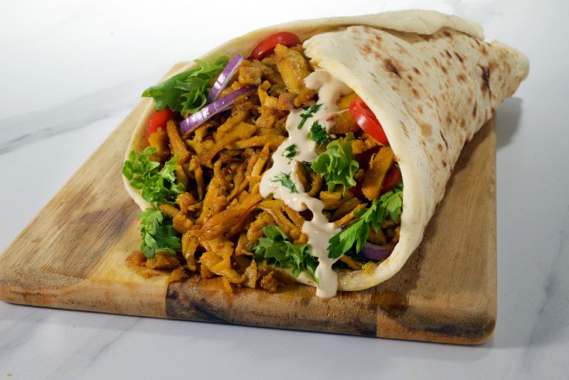 Provero Shawarma Strips in a laffa wrap with tahini and fresh vegetables
